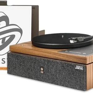 Wooden Stack Stone turntable with gray and white vinyl cover next to the vinyl record player